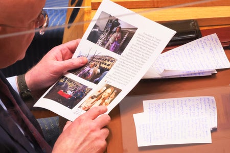 Hands holding documents