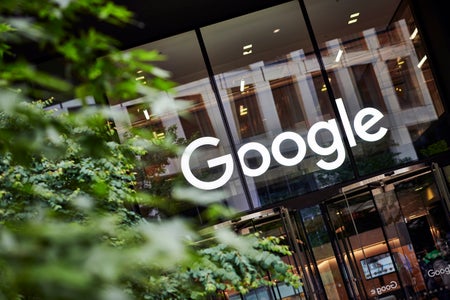 Detail of the entrance to the Google UK offices in London, with the Google logo visible above the doorway.
